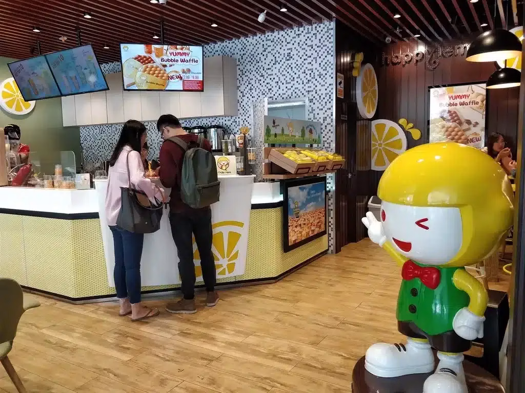 Bubble tea shop with customers ordering