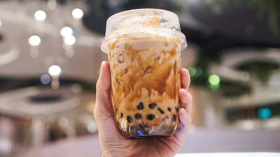 hand holding bubble tea