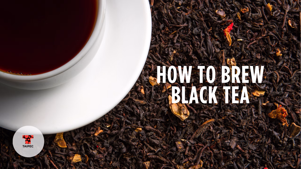 Cup of black tea with loose leaves